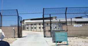 Image of gates separating Hakea Juvenile Facility from adult section of Hakea Prison