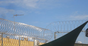 Picture of razor wire over top of shade sails