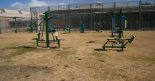 Outside gym with isometric exercise equipment for all prisoners to use