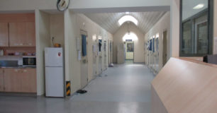 Image of a corridor with cells either side at the crisis care unit.