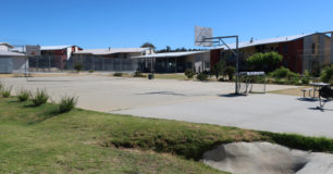 Image of an outside basketball court at Acacia Prison