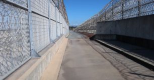 Image of razor wire perimeter fencing at Casuarina Prison