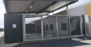 Image of the outside gate looking through to the Sallyport at Melaleuca Women's Prison